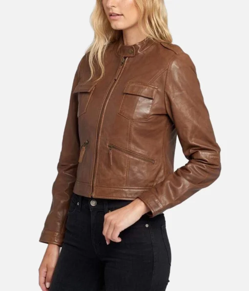 Women’s light brown cafe racer lambskin leather jacket with quilted lining, zipper closure, and band collar