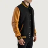 Men’s black varsity letterman jacket with wool body and gold leather sleeves