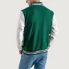 Men’s kelly green varsity letterman jacket with wool body and white leather sleeves side view